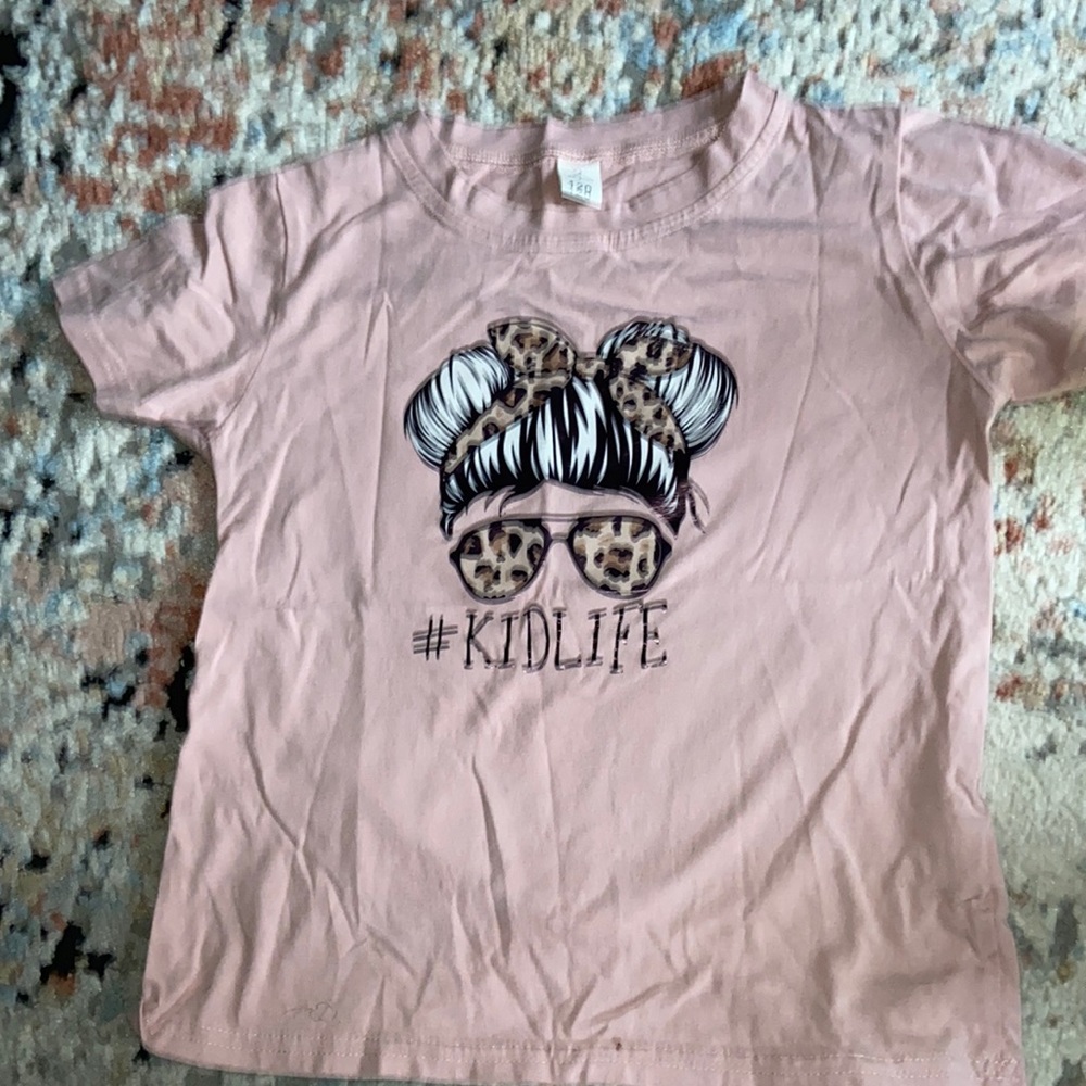Girl’s bun and shades T-shirt New